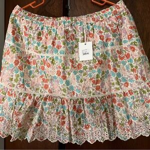 Floral eyelet mini skirt